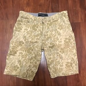 Tropical print shorts.